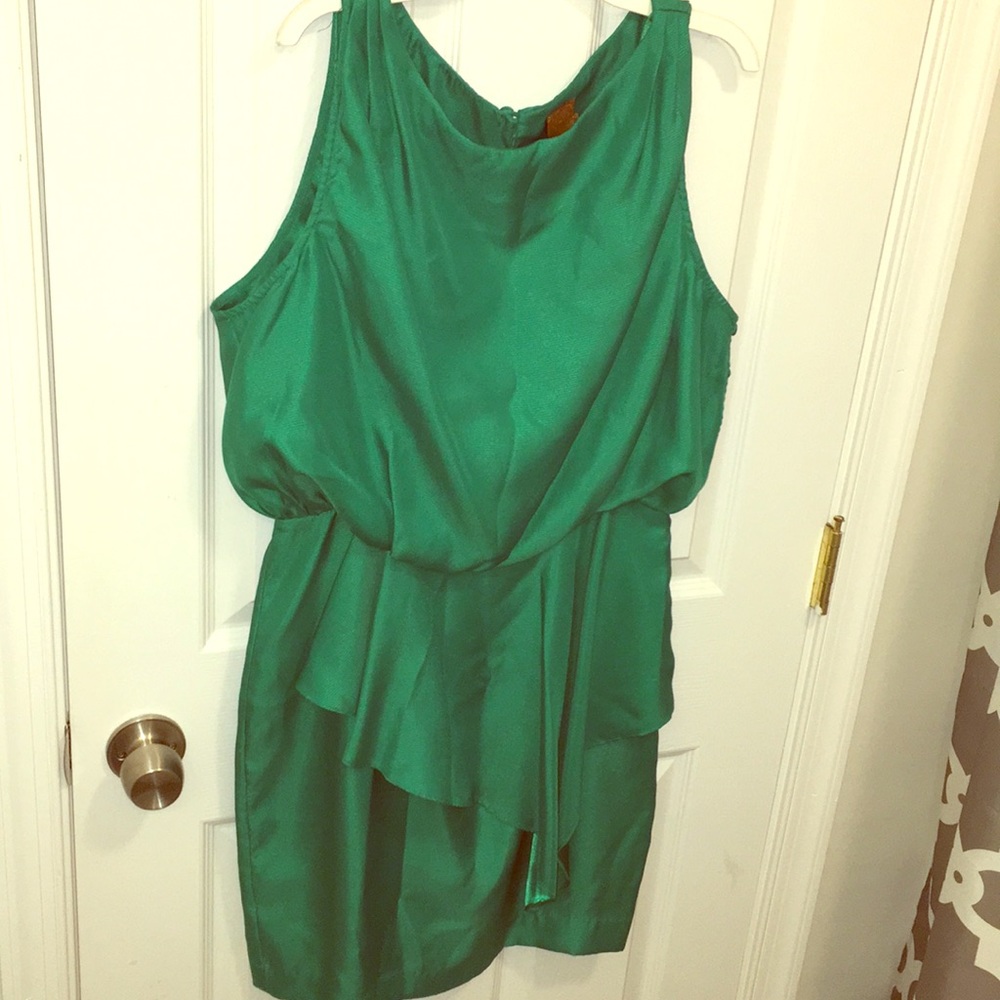 Green cocktail dress with peplum