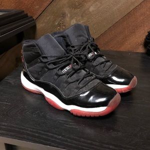 Air Jordan Bred 11’s - size 7