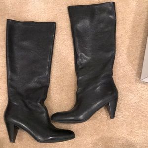 High black leather boots.