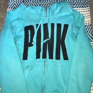 Hooded Victoria’s Secret sweat shirt.