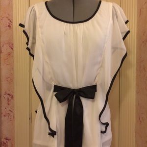 White 1930s style flutter sleeve blouse