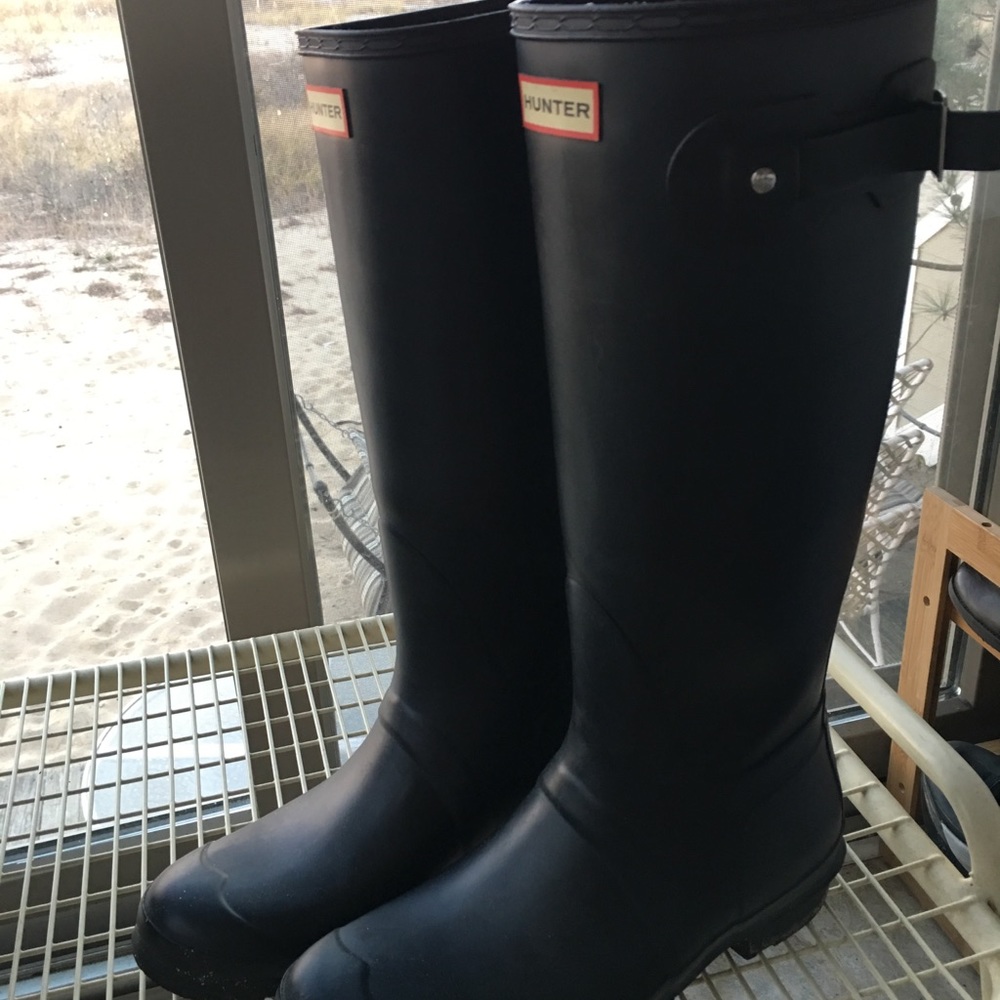 Tall black Hunter rain boots