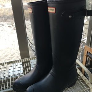 Tall black Hunter rain boots