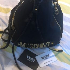 Black Moschino handbag with gold detailing