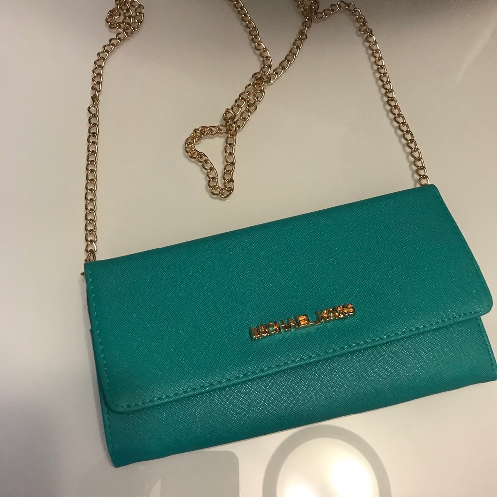 Turquoise clutch,never worn