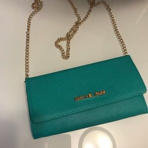 Turquoise clutch,never worn