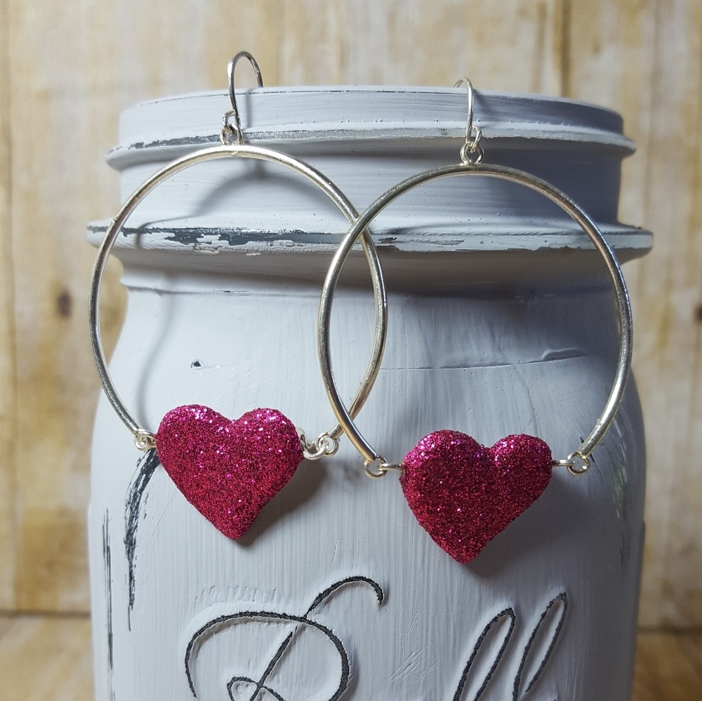 NWOT. Dangle earrings. Silver tone. Pink.