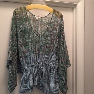 CAbi tunic. Green/orange print.