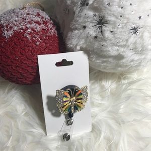 Butterfly badge holder