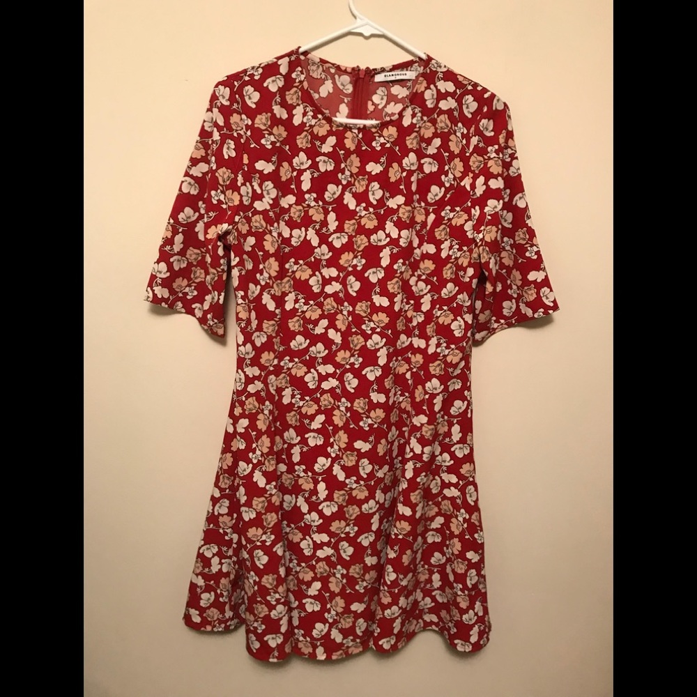 Brand GLAMOROUS red dress with flower details.