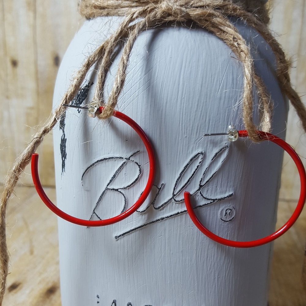 NWOT. Red hoop earrings.