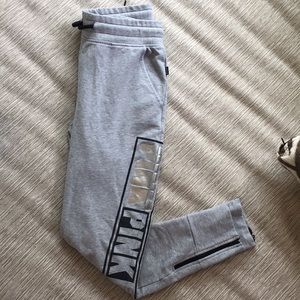 GRAY PINK JOGGERS W/ ZIP AT THE BOTTOM
