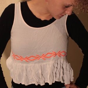 A white and a black crop top in Women's
