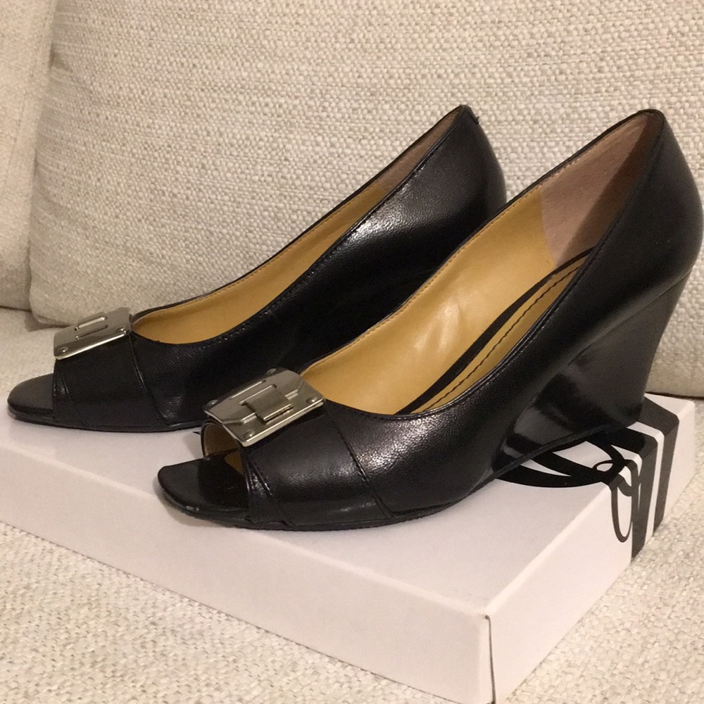 Nine West wedges in black leather.