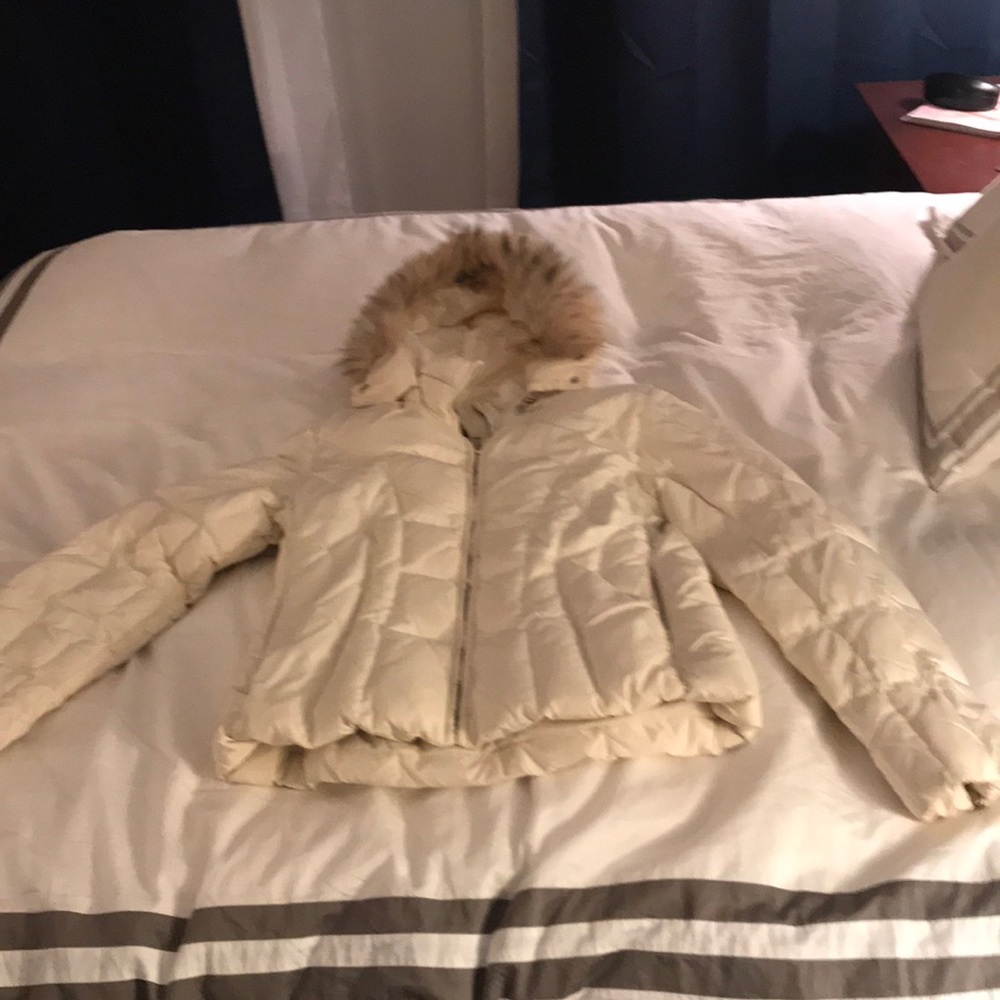 Women’s white down jacket by Marc New York.