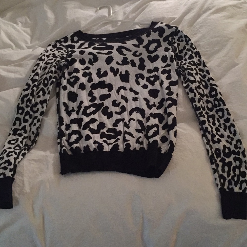 Reversible black and white cheetah print sweater