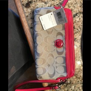 Coach coral and khaki large iPhone wristlet