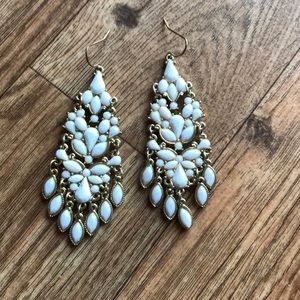 White dangle earrings