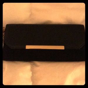 Black dressy clutch purse.