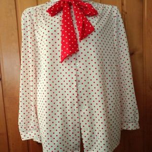 white and red polka dot blouse