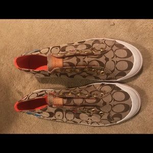 Coach women’s slip ons- NWT!