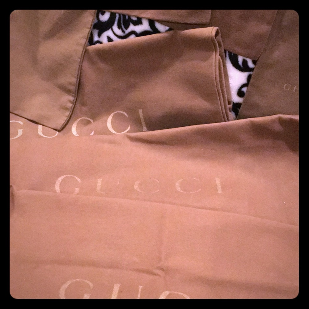 Gucci dustbags.