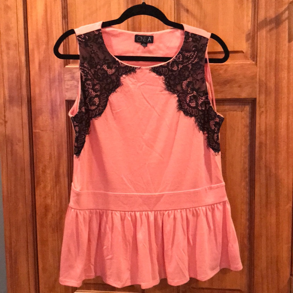 Pink and black lace peplum top