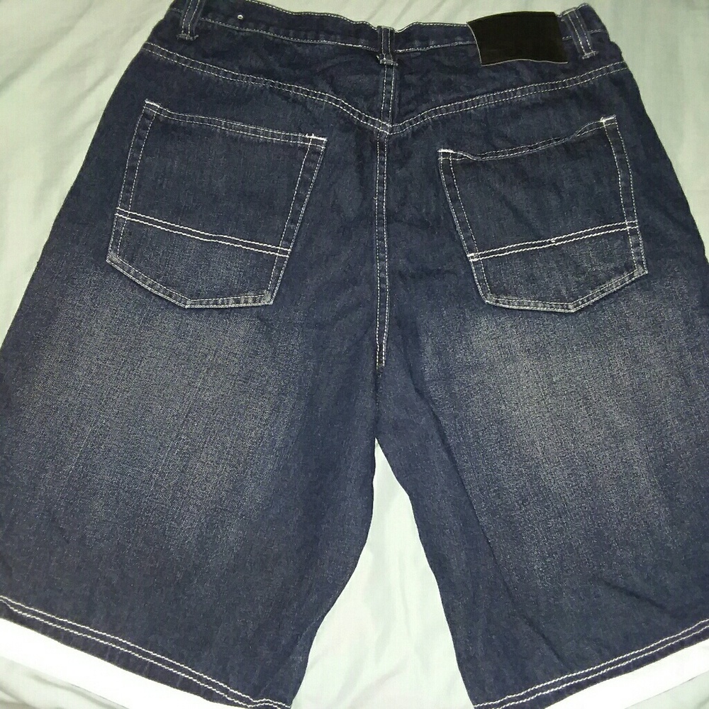 Men's jeans shorts white bottoms.