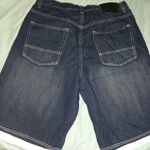 Men's jeans shorts white bottoms.