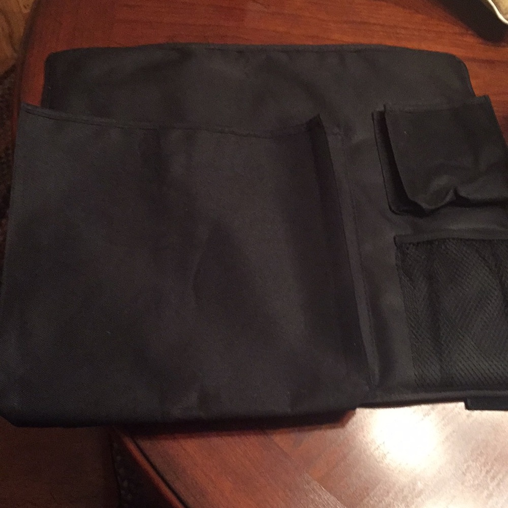 Bed side storage for remotes/ magazines, etc.