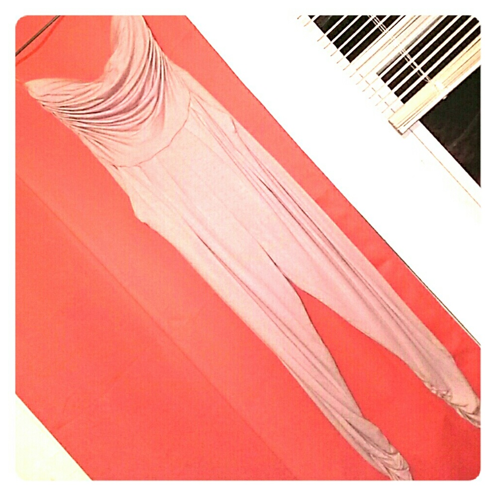 Strapless jumpsuit w/ pockets.