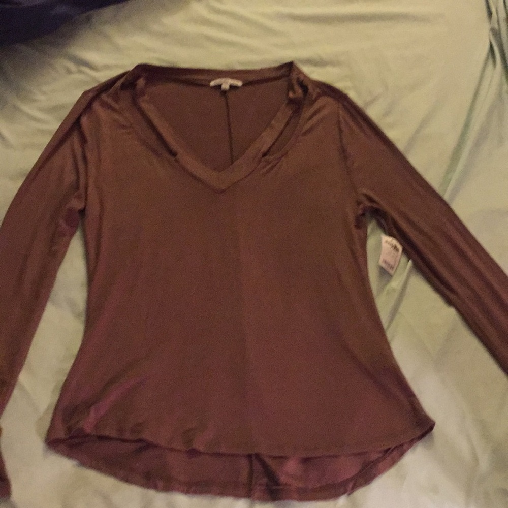 New with tags, long sleeved light weight shirt!