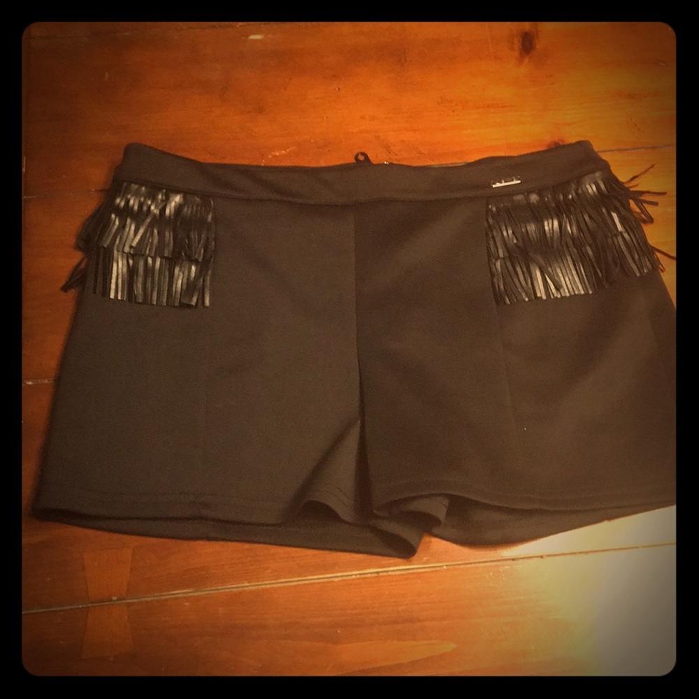 Gorgeous unique black shorts with fridge detail!