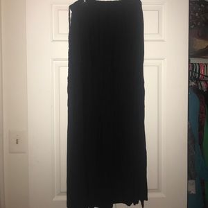 Long black pleated skirt