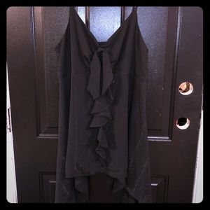 Handkerchief cut sleeveless top with iridescent