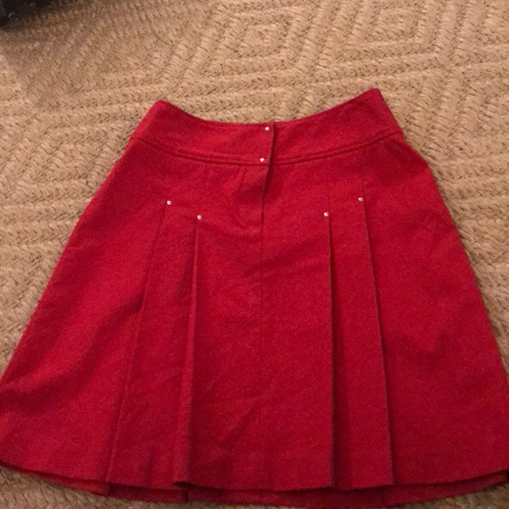 Red pleated skirt