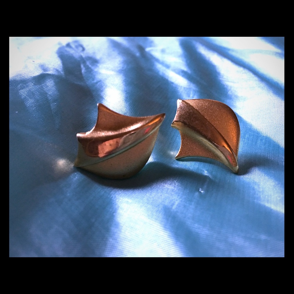 Vintage gold toned earrings. Textured