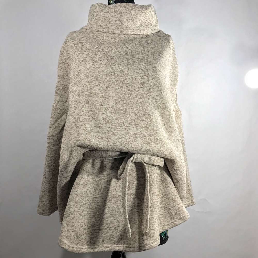 Tan turtleneck sweater Cape with belt
