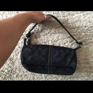 Black clutch coach purse