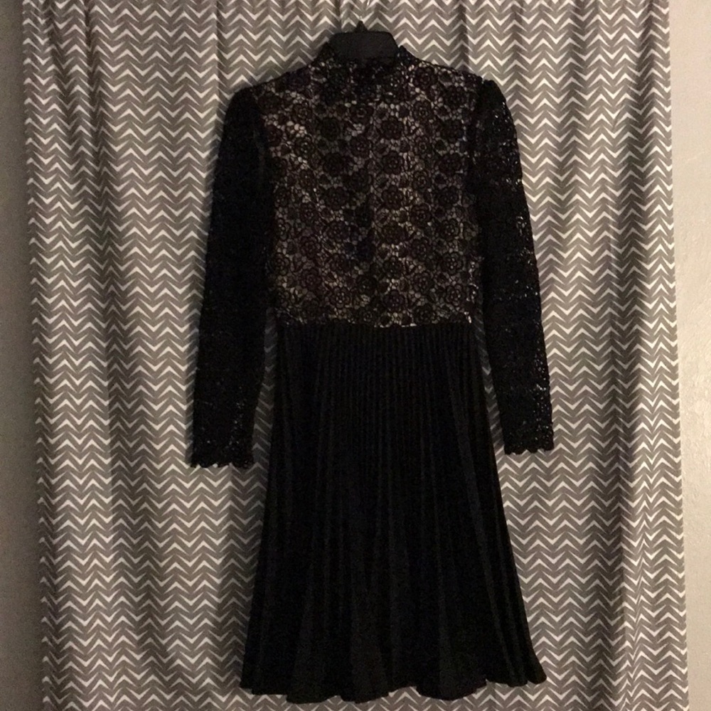 A crocheted/laced dress(top) with a black bottom - Picture 2 of 2
