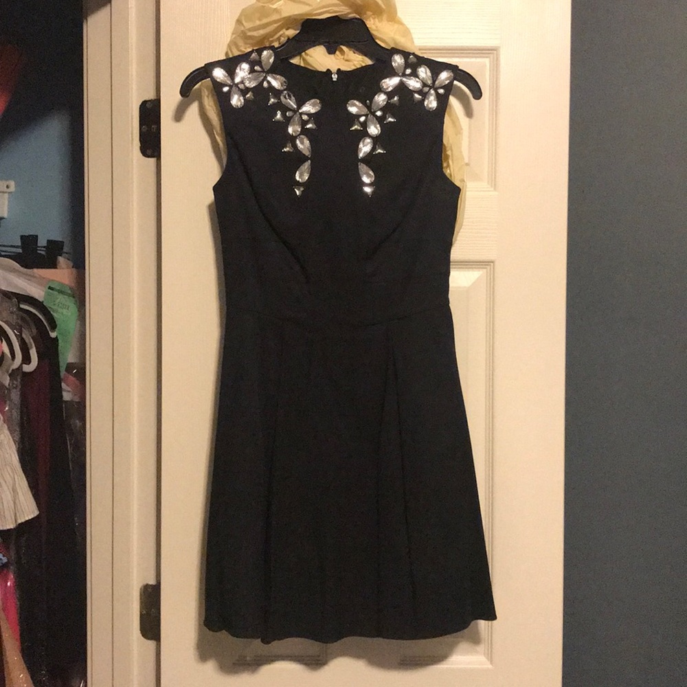 Black/navy colored dress with crystals