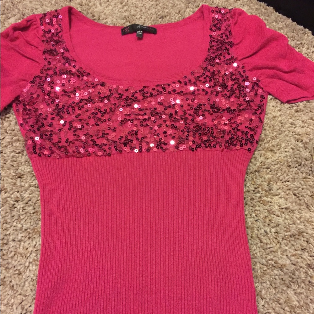 Two Christmas shirts.