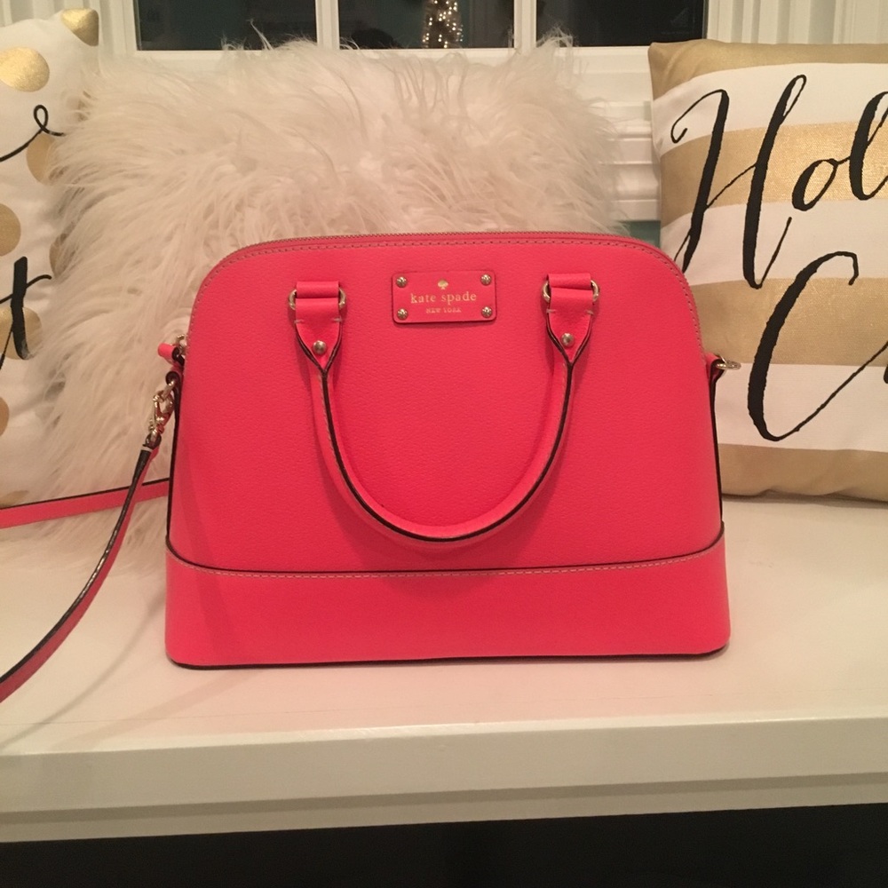 Kate spade hand bag with a cross body strap