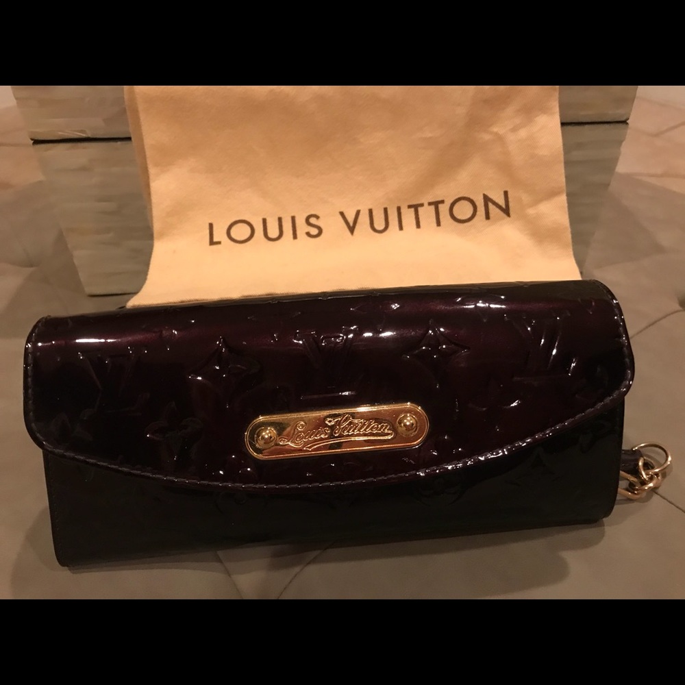 Authentic Louis Vuitton Amarante Monogram Clutch