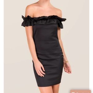 Francesca’s ruffle off the shoulder black dress.