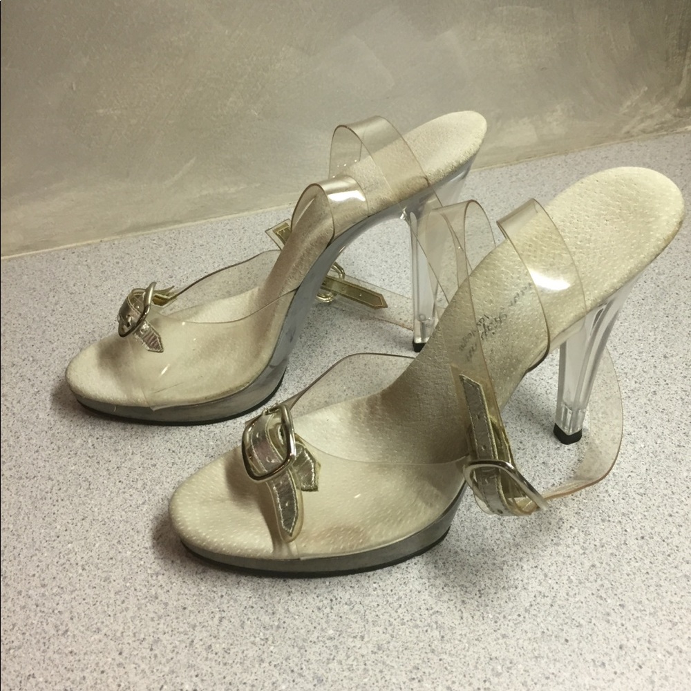 Norman Kaplan Las Vegas clear high heels shoes.