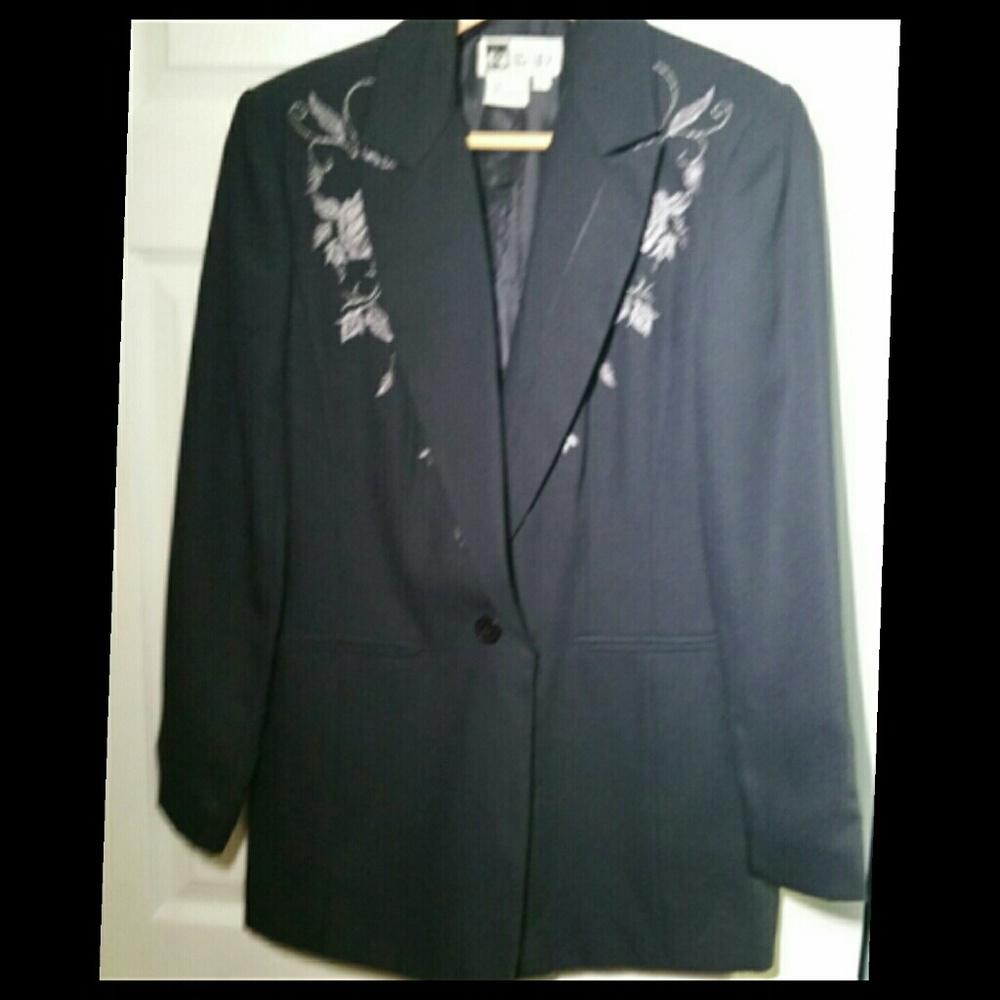 Jacket. Silver flower design.