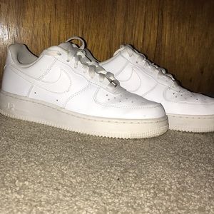 All white Nike Air Force 1s