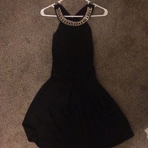 Francesca’s black dress