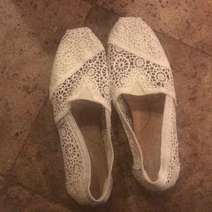 TOMS lace slip ons